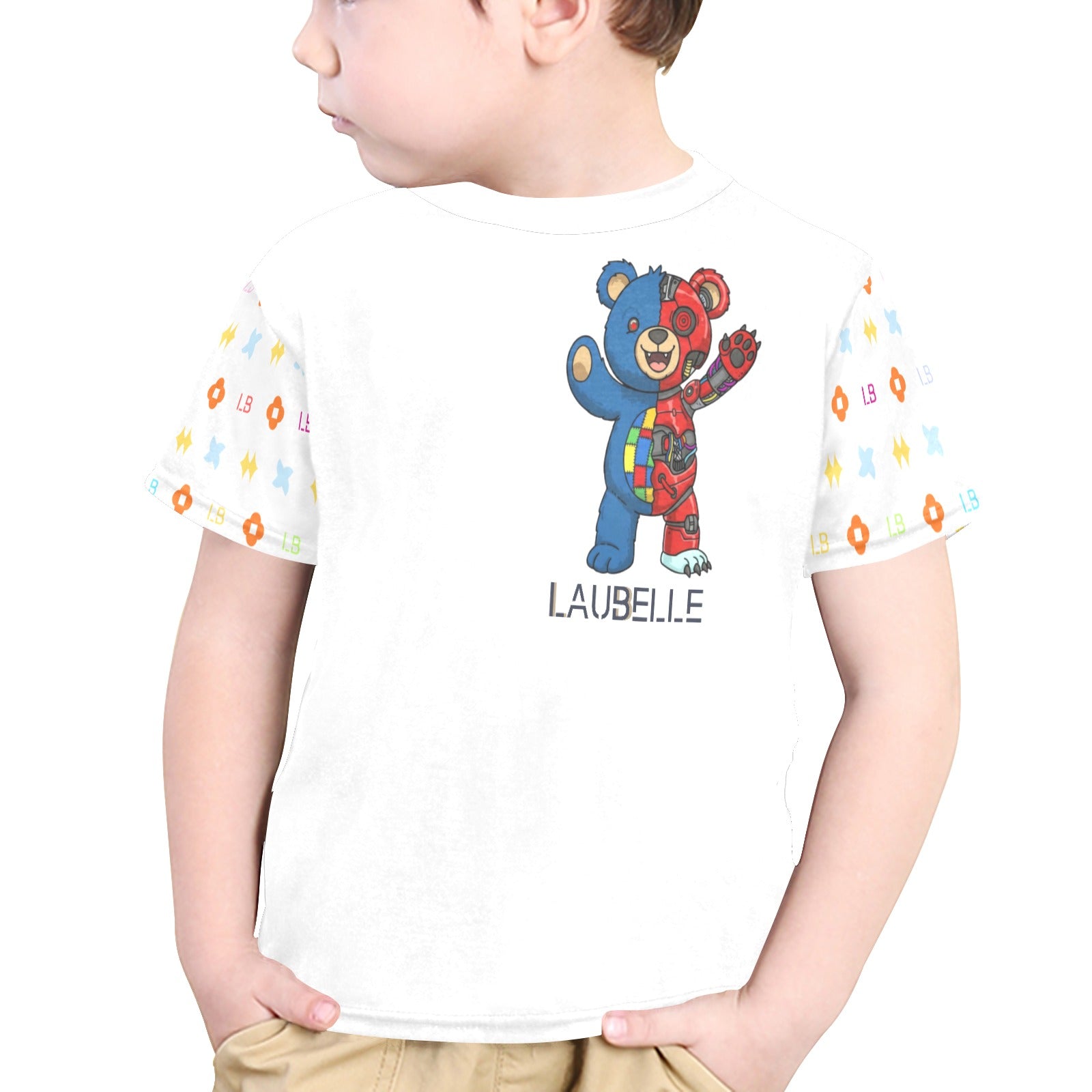 Child in white shirt with colorful bear design and patterned sleeves, looking to the side.